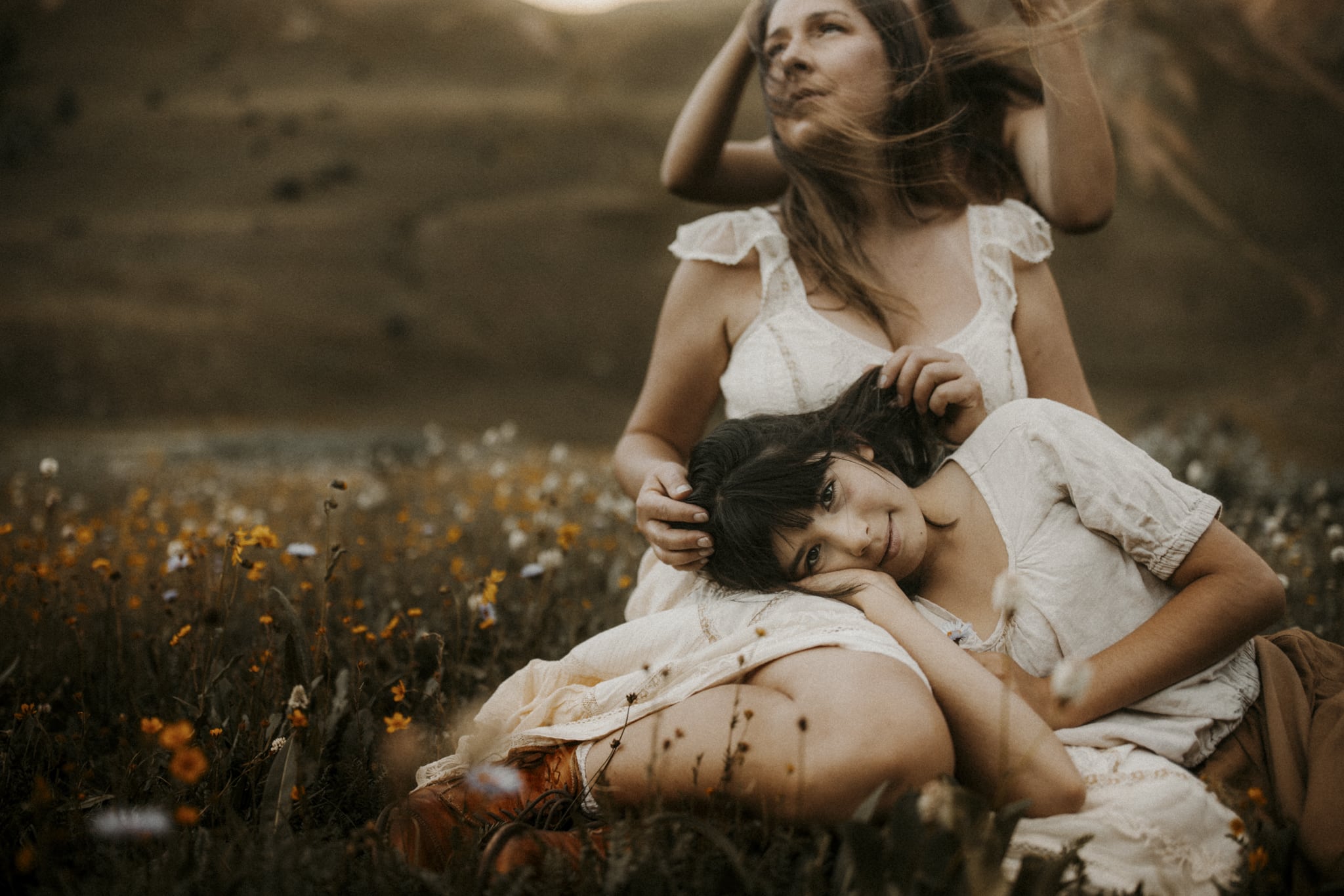 Family Photography, Woman and daughter sitting in a field of flowers